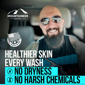 Mountaineer Brand bar in hand on wet scalp showing easy application and quick rinse benefit