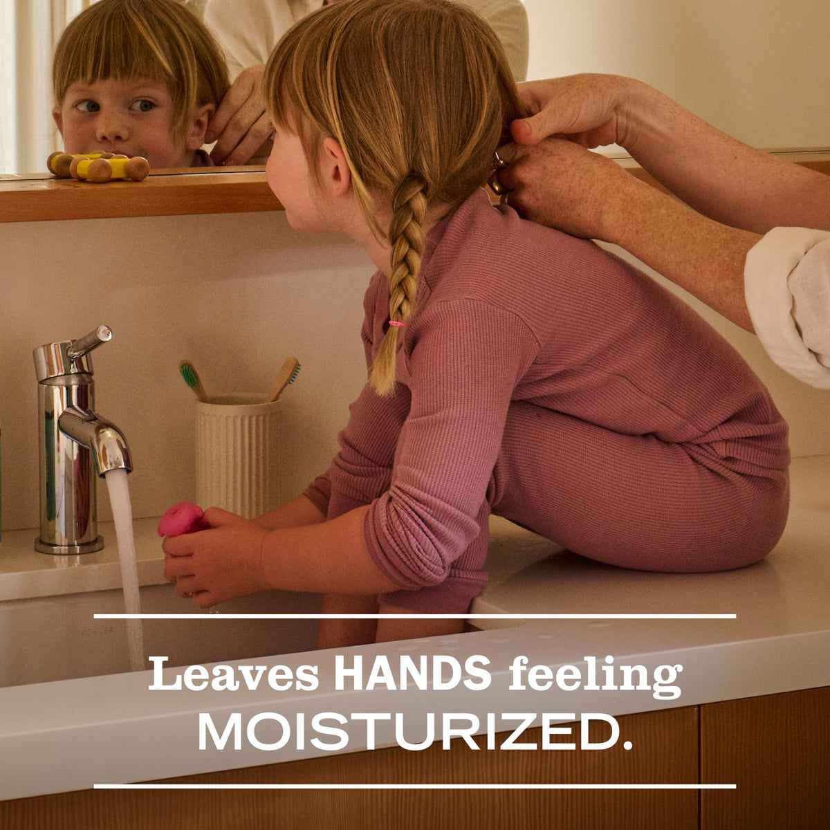 Mrs. MEYER'S soap foam close-up illustrating gentle lather that preserves skin moisture