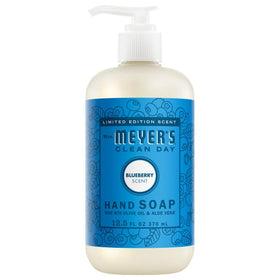 Mrs. MEYER'S Dandelion bottle staged in bathroom, floral scent enhances sink area
