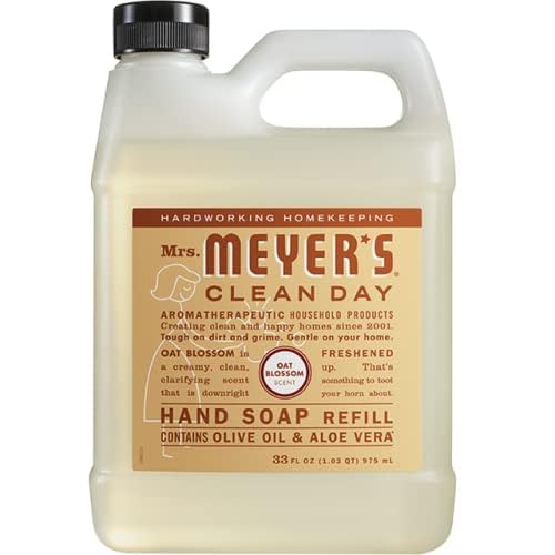 Mrs. MEYER'S foamy soap in a sink with hands, showing effective gentle cleaning