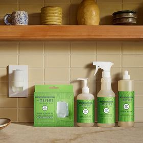 Mrs. MEYER'S size comparison in hand showing 12.5 fl oz portable pump convenience