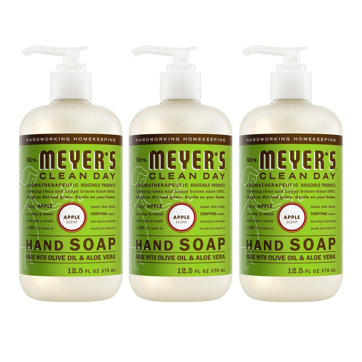 Mrs. Meyer's juicy apple front packaging showing three bottles and clear scent benefit