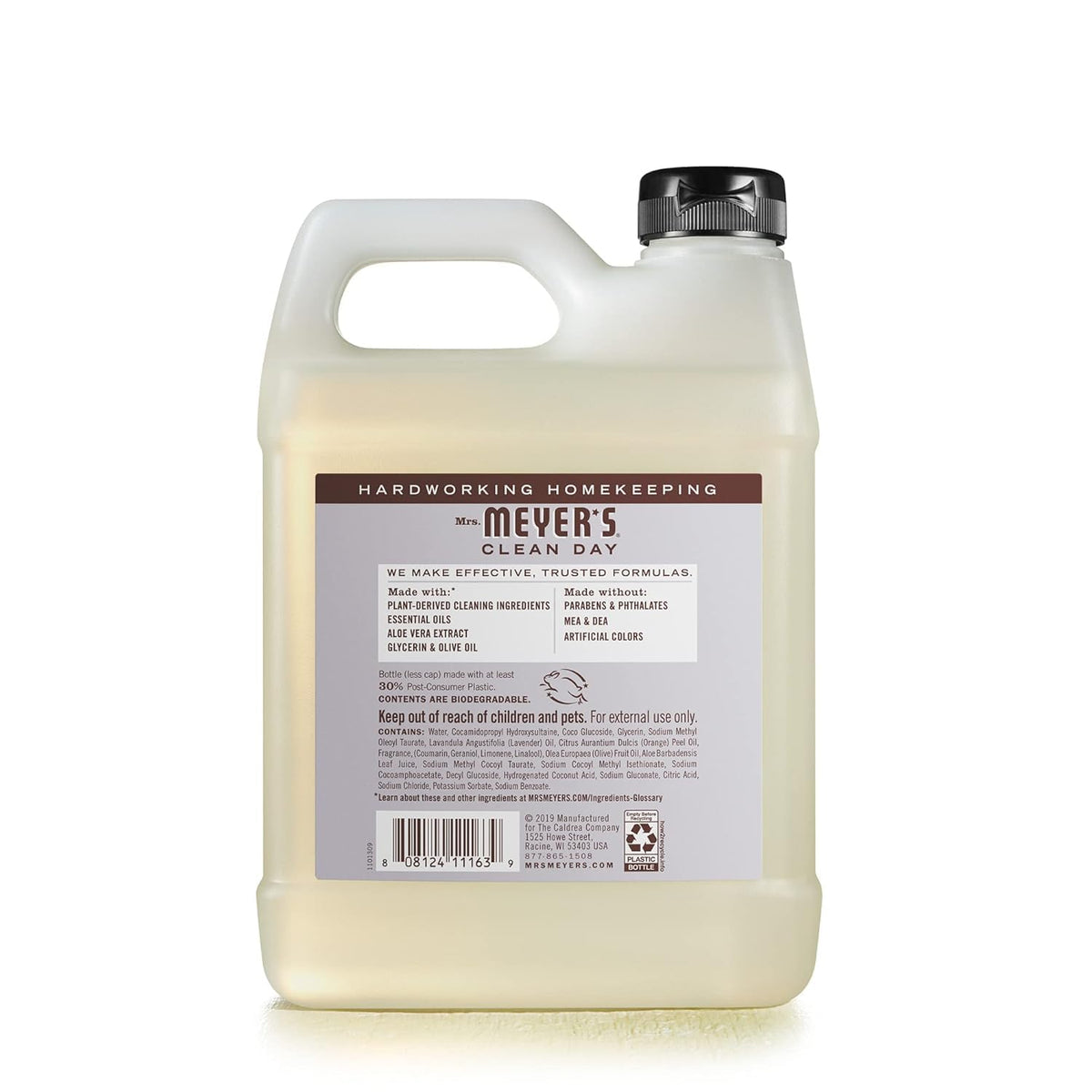 Pouring Mrs. MEYER'S lavender refill into a pump dispenser for economical refills and reduced waste