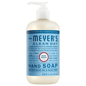 Mrs. MEYER'S pump dispensing soap at kitchen sink for easy use