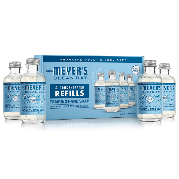 Mrs. MEYER'S front label of Rain Water concentrate showing scent and glass bottle, clear eco benefit
