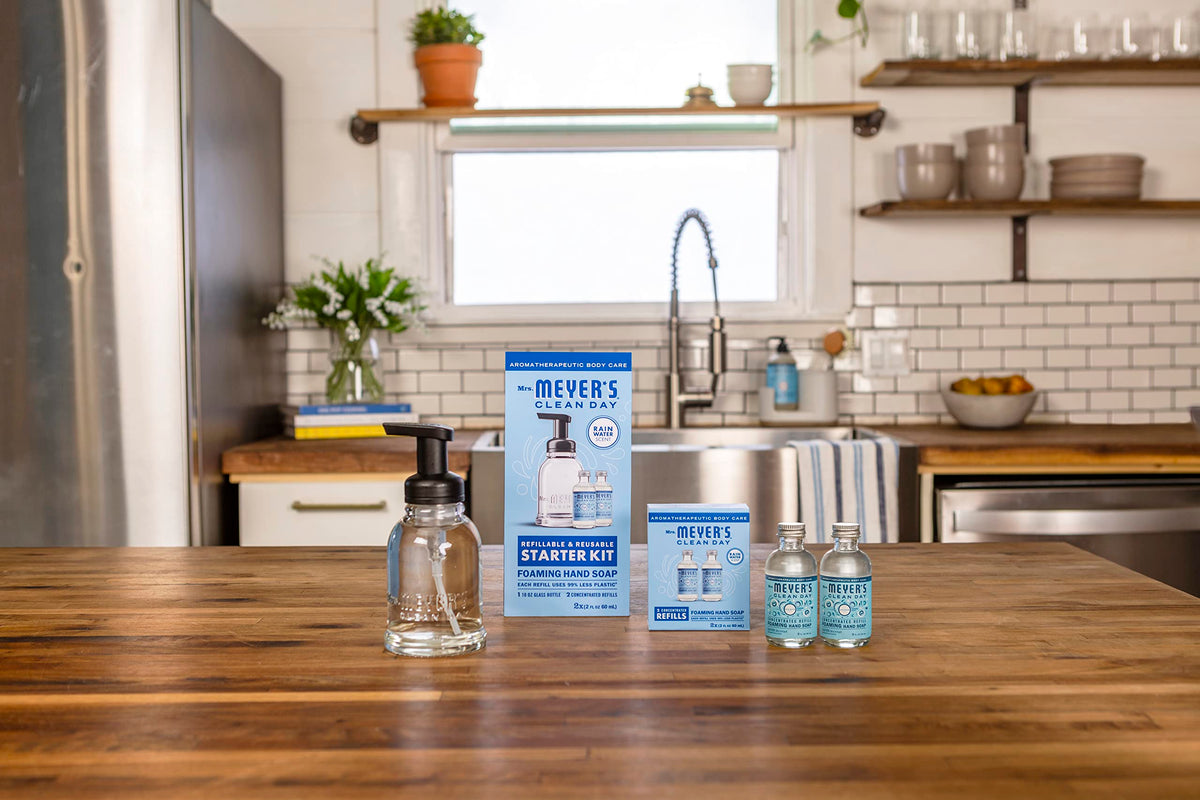 Mrs. MEYER'S refill pack beside a 10 oz bottle to show yield and reduced-plastic benefit