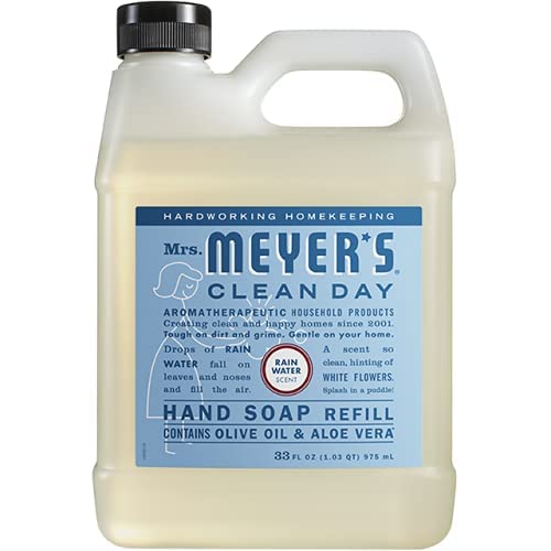 Mrs. MEYER'S liquid pouring from a refill bottle into a dispenser, demonstrating easy refill