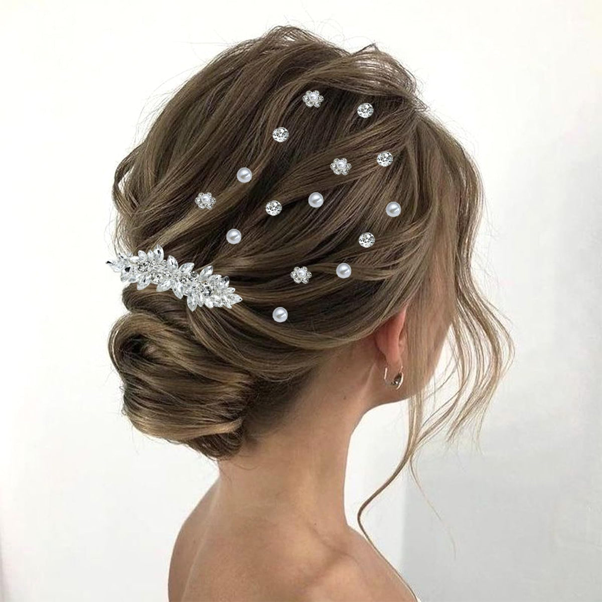 Mulzile lifestyle wedding scene with pins accenting a bride’s hairstyle beautifully