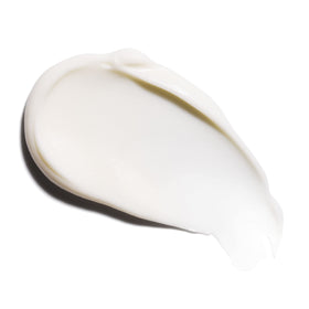 Applying Murad to under-eye with fingertip to show gentle targeted use