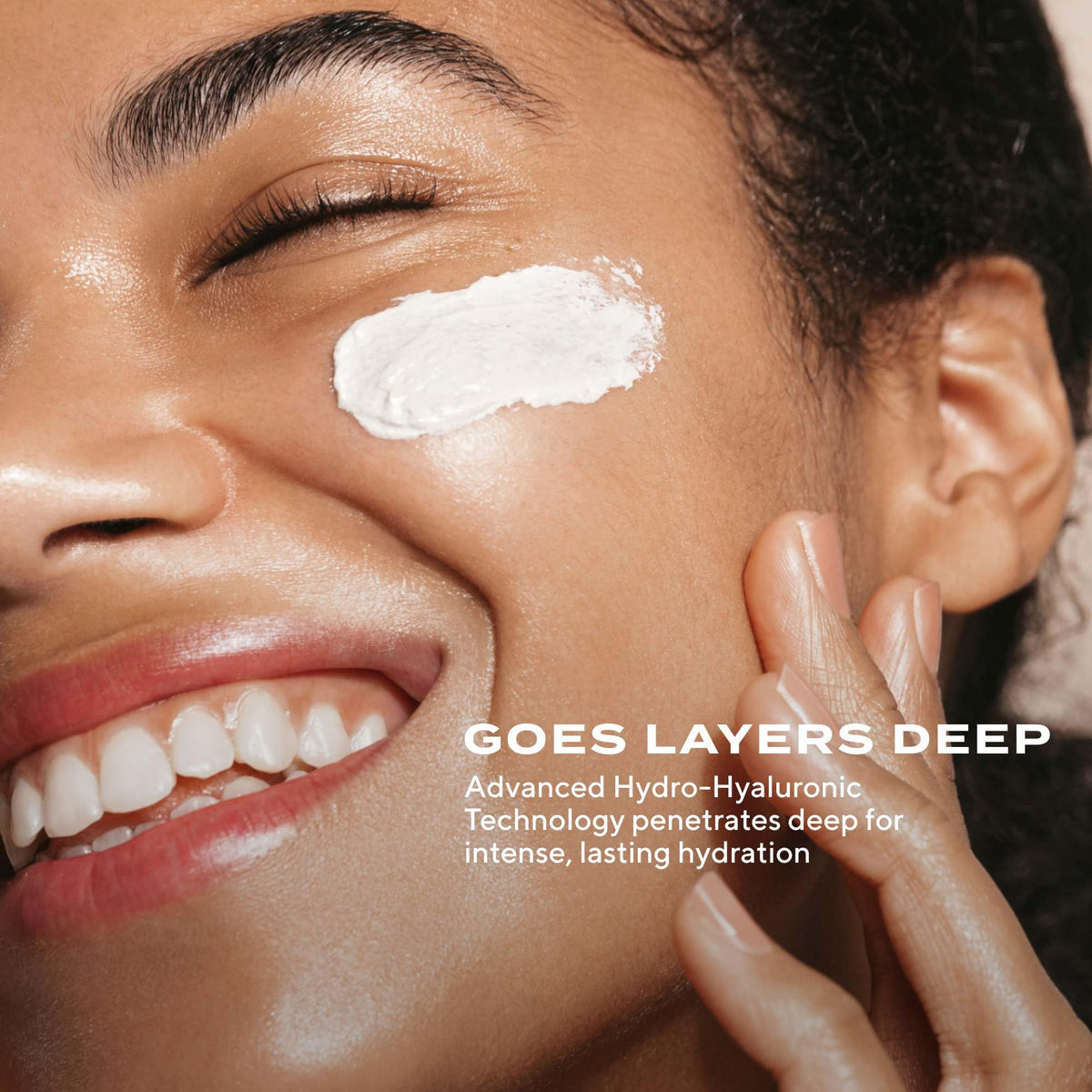 Murad cream dollop on fingertip demonstrating easy application and spreadability