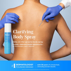 Murad body spray applied to upper back demonstrating touch-free treatment benefit