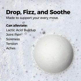 Muscle Rehab close-up texture of a single bath bomb showing magnesium-rich grains