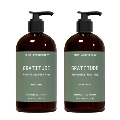 Muse Apothecary front packaging showing Warm Cedar 16 oz bottle and calming scent benefit