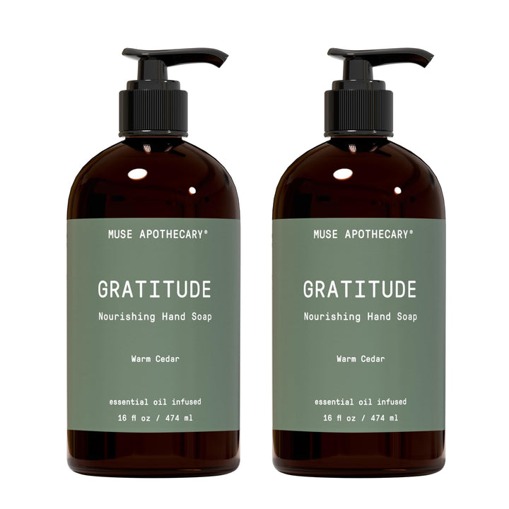 Muse Apothecary front packaging showing Warm Cedar 16 oz bottle and calming scent benefit