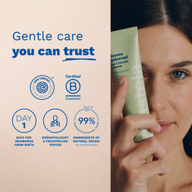 Mustela balm applied on adult hands and cuticles to soften skin