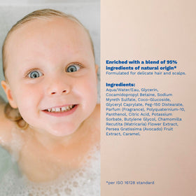 Mustela lifestyle image parent holding baby after bath comfort