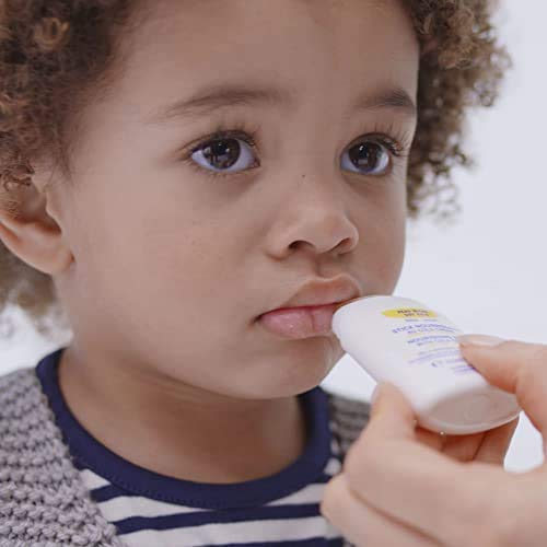 Mustela nourishing stick applied to baby cheek illustrating gentle soothing
