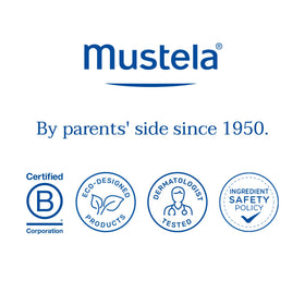 Mustela bottle held in hand showing 6.76 fl oz scale