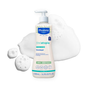 Mustela Stelatopia front packaging showing product and benefit of gentle cleansing