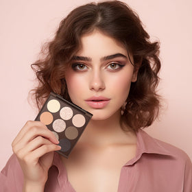 MYSTER ROSEY palette held in hand to show travel-friendly size