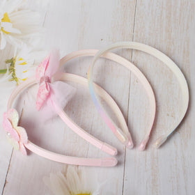 naibirdr girl wearing headband demonstrating stylish hold