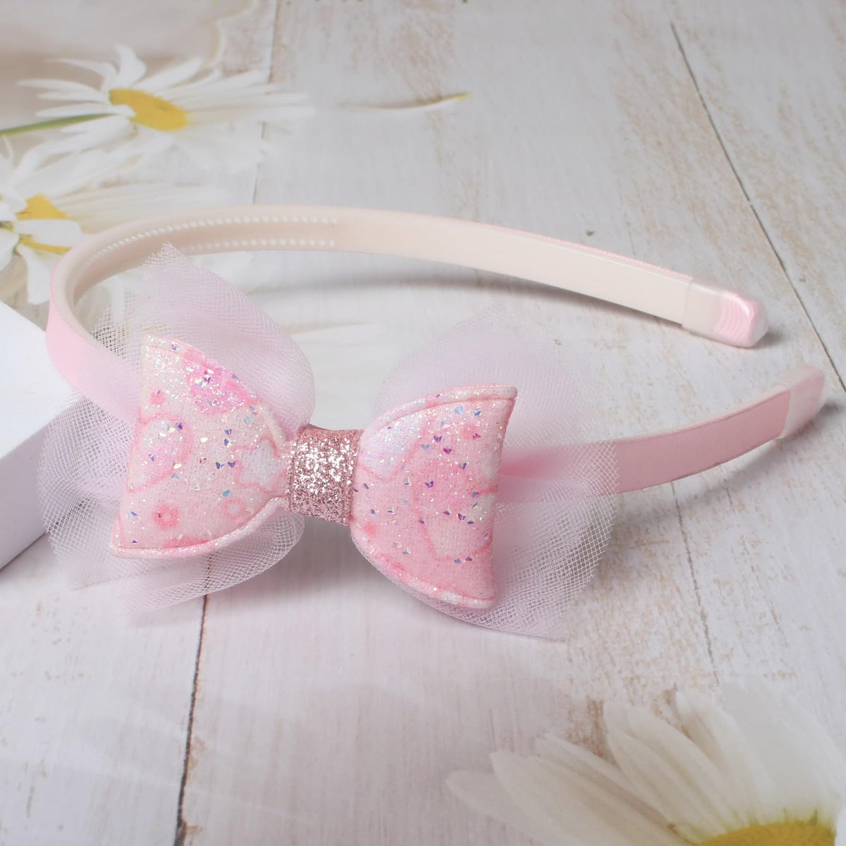 naibirdr headband on hand showing size and comfortable fit