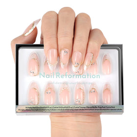 Nail Reformation front packaging showing glossy French nude almond set and kit benefits