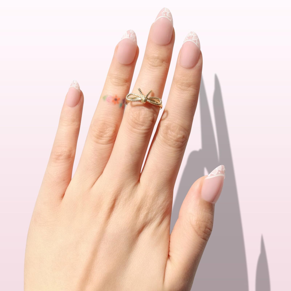Nail Reformation glossy finish reflecting light to showcase chip-resistant shine and salon look