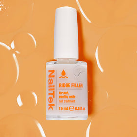Bottle label and ingredient panel of Nail Tek highlighting conditioning agents