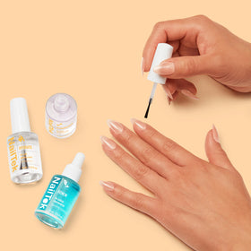 Nail Tek Renew bottle open with brush demonstrating easy application