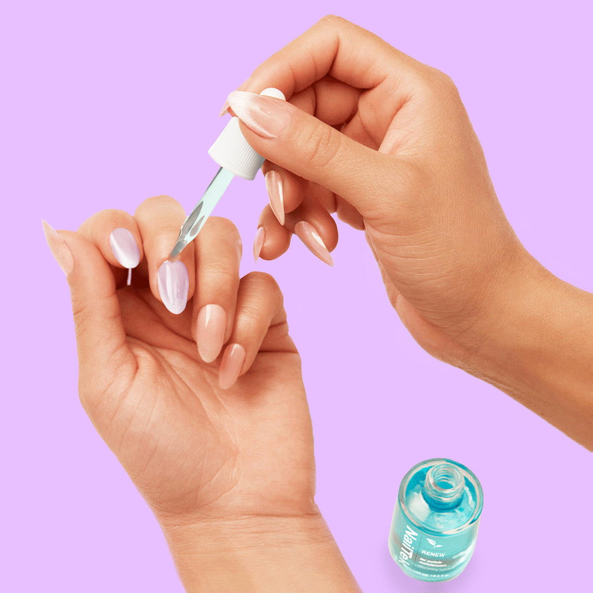Nail Tek in-use on fingernails demonstrating simple home application routine