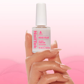 Bottle held in hand for scale demonstrating compact 0.5 fl oz convenience benefit