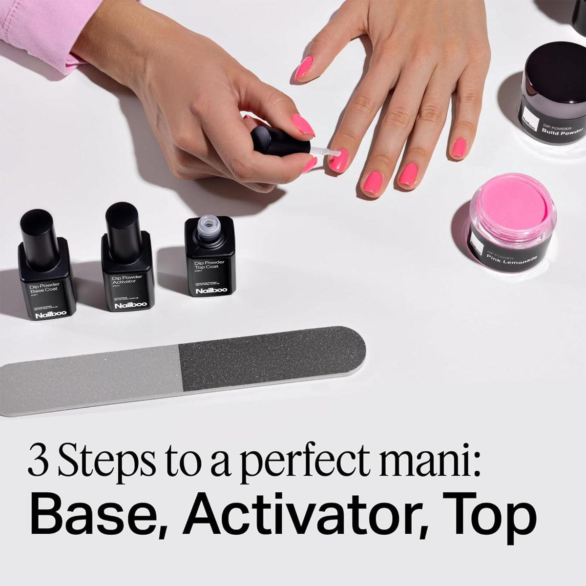 Nailboo Base Coat applied to nail tip demonstrating strong adhesion
