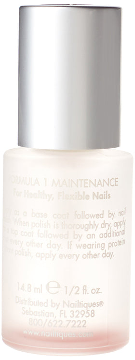 Close-up of Nailtiques Formula 1 brush applying clear treatment to nail for repair