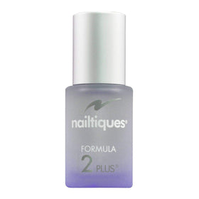 Nailtiques Formula 2 brush applying thin coat on a nail to visibly strengthen surface