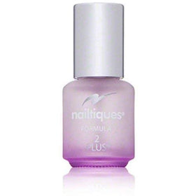 Nailtiques brush applying clear finish on nail, demonstrating smooth application and protection