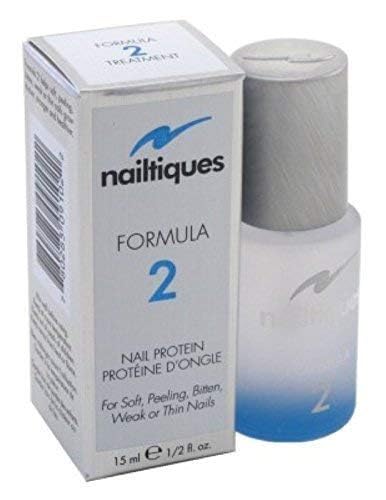 Nailtiques bottle beside a coin to show 0.5 oz size and travel-friendly benefit