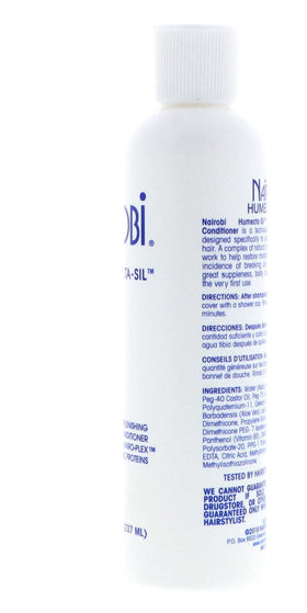 Nairobi 8 ounce bottle in hand showing compact travel-friendly size and convenience