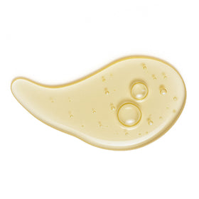 naissant applying to damp hair, improves manageability and reduces frizz while drying