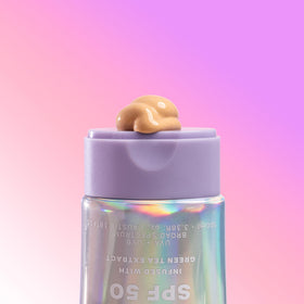 Naked Sundays applied on arm showing subtle golden shimmer and radiance