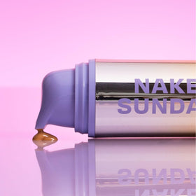 Naked Sundays in a beach bag illustrating portable sun protection and radiance benefit