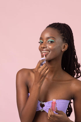 Naked Sundays applied on lips demonstrating subtle tint and glossy finish