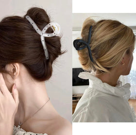 Nalodu clip used in an updo demonstrating secure hold for long curly hair
