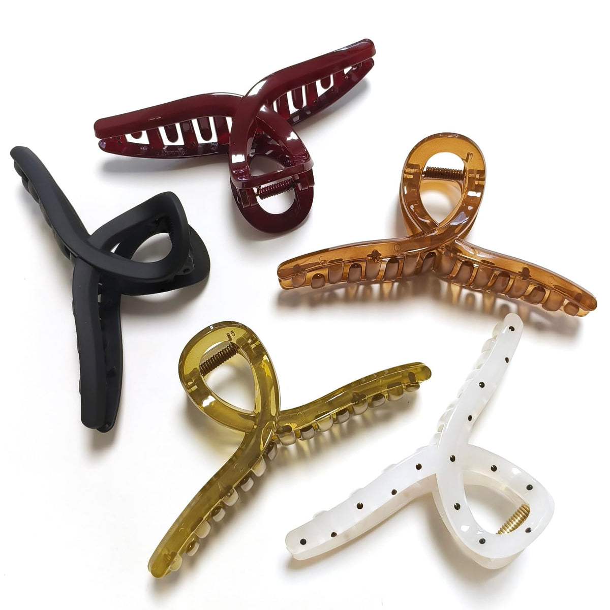 Nalodu front view showing five jumbo claw clips and color variety for reliable hold
