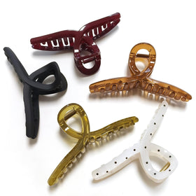 Nalodu front view showing five jumbo claw clips and color variety for reliable hold