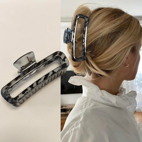 Nalodu grey leopard clip securing curly hair for comfortable all-day hold