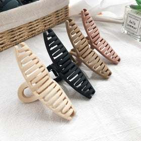 Nalodu clip in half-up hairstyle demonstrating easy everyday use