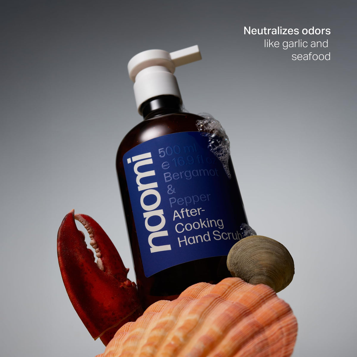 Naomi scrub texture close-up highlighting creamy exfoliant for gentle smoothing