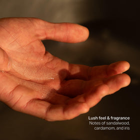 Naomi scale size comparison beside a hand showing bottle capacity and portability