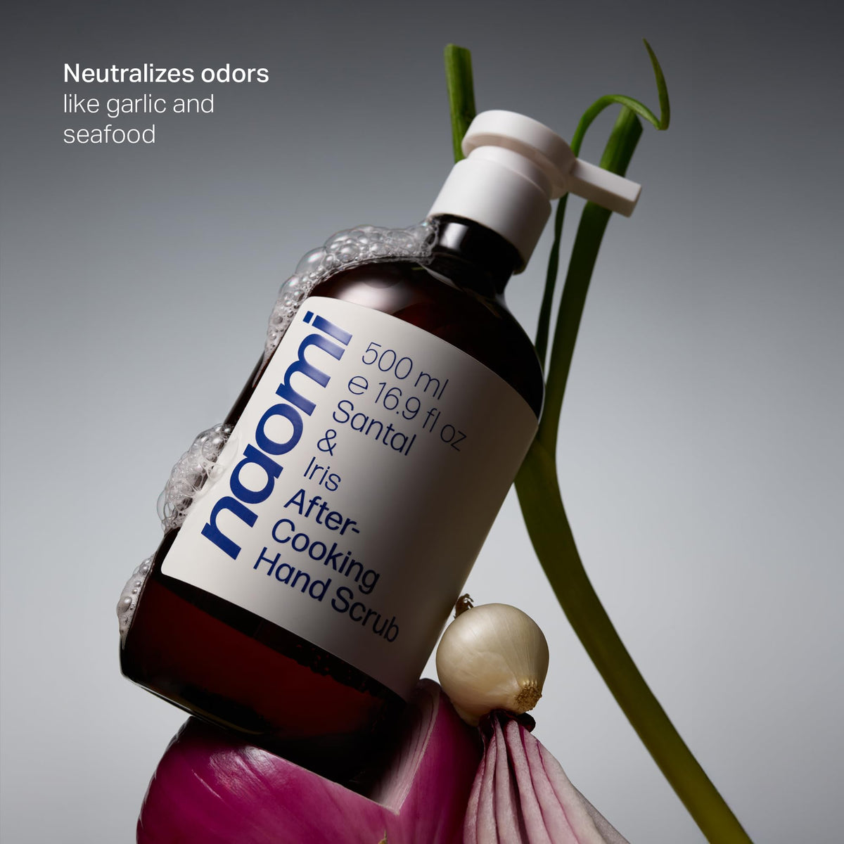 Naomi texture close-up showing jojoba beads and creamy formula for gentle exfoliation